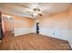 Bright dining room with hardwood floors and a ceiling fan at 8000 Glencannon Dr, Charlotte, NC 28227