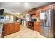 Spacious kitchen with stainless steel appliances and wooden cabinetry at 8115 Kingsland Dr, Waxhaw, NC 28173