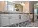 Elegant bathroom with double vanity, granite countertop, and large mirror at 900 Raffaelo Vw, Mount Holly, NC 28120