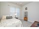 Bright bedroom with a queen bed and plenty of natural light at 900 Raffaelo Vw, Mount Holly, NC 28120