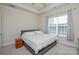 Spacious bedroom with large window and carpeted flooring at 900 Raffaelo Vw, Mount Holly, NC 28120
