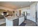 Island kitchen features granite countertops and opens to Gathering room at 900 Raffaelo Vw, Mount Holly, NC 28120