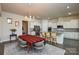 Modern kitchen with granite countertops and stainless steel appliances at 900 Raffaelo Vw, Mount Holly, NC 28120