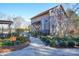 Community pool house with adjacent walkway and landscaping at 900 Raffaelo Vw, Mount Holly, NC 28120