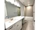 Modern bathroom with double vanity, large mirror and separate tub and shower at 9657 Liberty Hill Dr, Mint Hill, NC 28227
