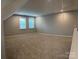 Bonus room with carpet and two windows at 9657 Liberty Hill Dr, Mint Hill, NC 28227