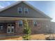 Charming brick and siding home with well-maintained landscaping at 9657 Liberty Hill Dr, Mint Hill, NC 28227