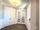 Inviting foyer features elegant French doors and hardwood floors at 9657 Liberty Hill Dr, Mint Hill, NC 28227