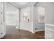 Bright foyer featuring a white front door and wood-look flooring at 9657 Liberty Hill Dr, Mint Hill, NC 28227