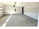 A spacious two car garage with sealed concrete floors is waiting for your cars at 9657 Liberty Hill Dr, Mint Hill, NC 28227