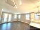Bright living room with luxury vinyl plank, flooded with natural light at 9657 Liberty Hill Dr, Mint Hill, NC 28227