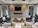 Comfortable living room with accent wall, electric fireplace and modern furnishings at 9657 Liberty Hill Dr, Mint Hill, NC 28227