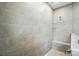 Close up of a spacious modern tiled shower with glass shelves at 9657 Liberty Hill Dr, Mint Hill, NC 28227