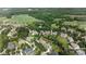 A beautiful aerial view of a neighborhood with well-maintained homes and lush greenery at 103 Glenholden Ln, Mooresville, NC 28115