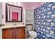 Bathroom featuring a vanity, toilet, cabinet, a large mirror, and a shower with a decorative curtain at 103 Glenholden Ln, Mooresville, NC 28115