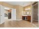 Spacious primary bathroom featuring a walk-in shower, vanity with a makeup table, and tile flooring at 103 Glenholden Ln, Mooresville, NC 28115