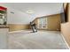 Large bonus room featuring carpet and treadmill at 103 Glenholden Ln, Mooresville, NC 28115