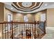 Open foyer with decorative railings and a view of the lower level at 103 Glenholden Ln, Mooresville, NC 28115