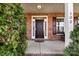 Inviting front entrance with brick facade, sidelights, and prominent house number display at 103 Glenholden Ln, Mooresville, NC 28115