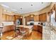 Gourmet kitchen featuring stainless steel appliances, granite countertops, and a center island with seating at 103 Glenholden Ln, Mooresville, NC 28115