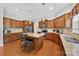 Spacious kitchen features a center island with granite countertops and stainless steel appliances at 103 Glenholden Ln, Mooresville, NC 28115