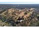 Aerial view of golf course community with houses and landscape at 104 Lazenby Dr, Fort Mill, SC 29715