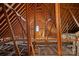 Unfinished attic space with exposed wooden beams at 104 Lazenby Dr, Fort Mill, SC 29715