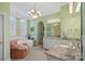 Spa-like bathroom with soaking tub and double vanity at 104 Lazenby Dr, Fort Mill, SC 29715