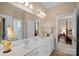 Bathroom with double vanity and view into bedroom at 104 Lazenby Dr, Fort Mill, SC 29715