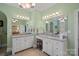 Elegant bathroom with double vanity and granite countertops at 104 Lazenby Dr, Fort Mill, SC 29715