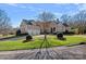 Beautiful two-story home with manicured lawn and landscaping at 104 Lazenby Dr, Fort Mill, SC 29715