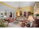 Living room with ample seating and large windows offering natural light at 104 Lazenby Dr, Fort Mill, SC 29715