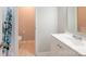 Clean bathroom with a white vanity and shower/tub combo at 10841 Twisted Bark Ln, Charlotte, NC 28213