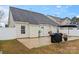 Large backyard patio with seating area and grill at 109 Copes Ct, York, SC 29732