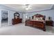 Well-lit bedroom with a king-size bed and walk-in closet at 109 Copes Ct, York, SC 29732