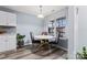 Bright breakfast nook with a white table and four gray velvet chairs at 109 Copes Ct, York, SC 29732