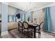 Elegant dining room, featuring a dark wood table and six light beige chairs at 109 Copes Ct, York, SC 29732