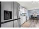 Stainless steel appliances and white cabinetry highlight this kitchen at 109 Copes Ct, York, SC 29732