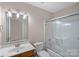 Clean bathroom with tub shower combo and vanity at 109 Washburn Range Dr, Mooresville, NC 28115