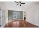 Spacious bedroom with hardwood floors and an accent wall at 109 Washburn Range Dr, Mooresville, NC 28115