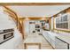 Modern kitchen with light blue cabinets and granite island at 11270 Widenhouse Rd, Midland, NC 28107