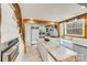 Renovated kitchen, featuring granite countertops and farm sink at 11270 Widenhouse Rd, Midland, NC 28107