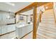 Kitchen with island and staircase with metal railing at 11270 Widenhouse Rd, Midland, NC 28107