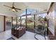 Relaxing screened porch with seating area and backyard view at 114 Runningdeer Dr, Mooresville, NC 28117