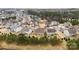 Aerial view of a residential neighborhood with houses and trees at 11519 Sweet Birch Ln, Charlotte, NC 28278