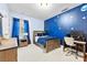 Bedroom featuring a blue accent wall with stars and traditional furniture at 11519 Sweet Birch Ln, Charlotte, NC 28278
