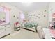Charming bedroom designed with a comfortable bed, plush decor, and ample natural light at 11519 Sweet Birch Ln, Charlotte, NC 28278