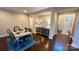 Bright dining room with hardwood floors and a view of the entryway at 11519 Sweet Birch Ln, Charlotte, NC 28278