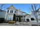 Two-story house with gray siding, black shutters, and a two-car garage at 11519 Sweet Birch Ln, Charlotte, NC 28278