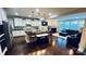 Modern kitchen with white cabinets, a large island, and stainless steel appliances at 11519 Sweet Birch Ln, Charlotte, NC 28278